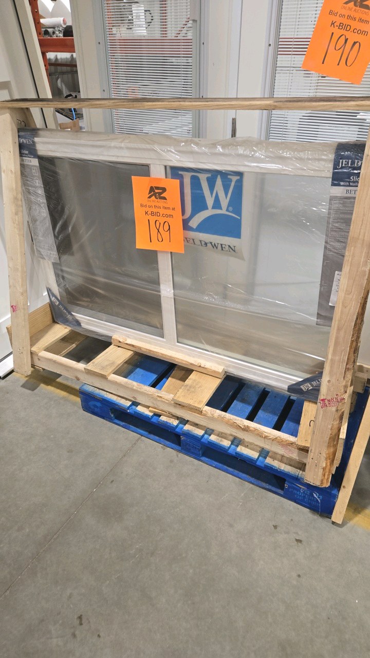 JELD-WEN V-2500 Series 59.5 in. W x 35.5 in. H Left-Handed White Vinyl Low-E Sliding Window w Brickmould Nail Fin Frame