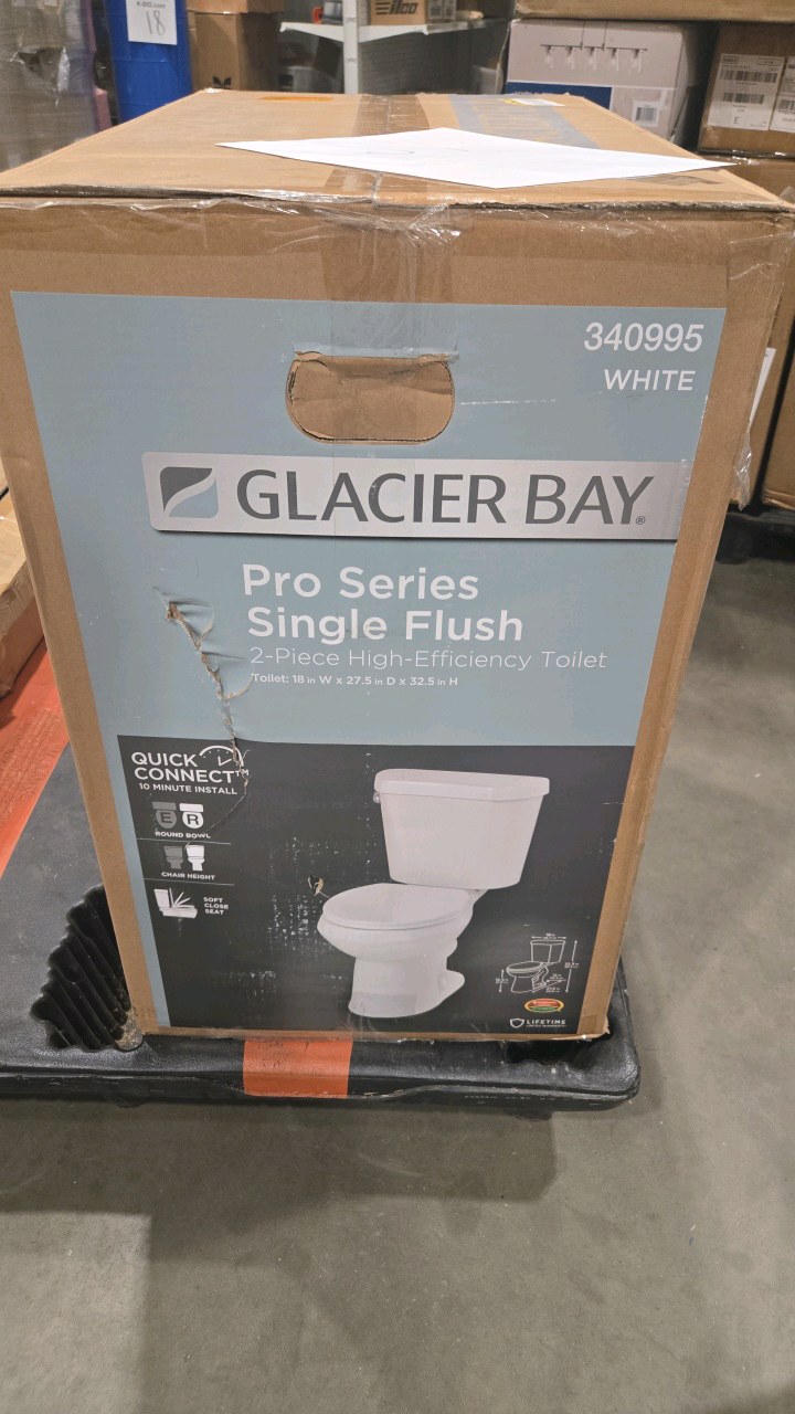 Glacier Bay 12 inch Rough In Two-Piece 1.28 GPF Single Flush Round Toilet in White Seat Included
