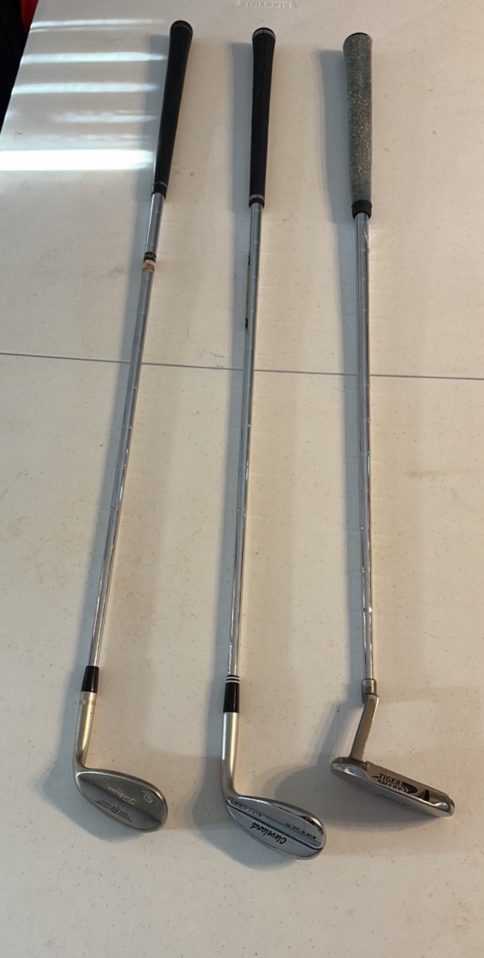 (3) GOLF clubs Titleist, Cleveland RTX 6, and Great White Tiger Shark GW-4