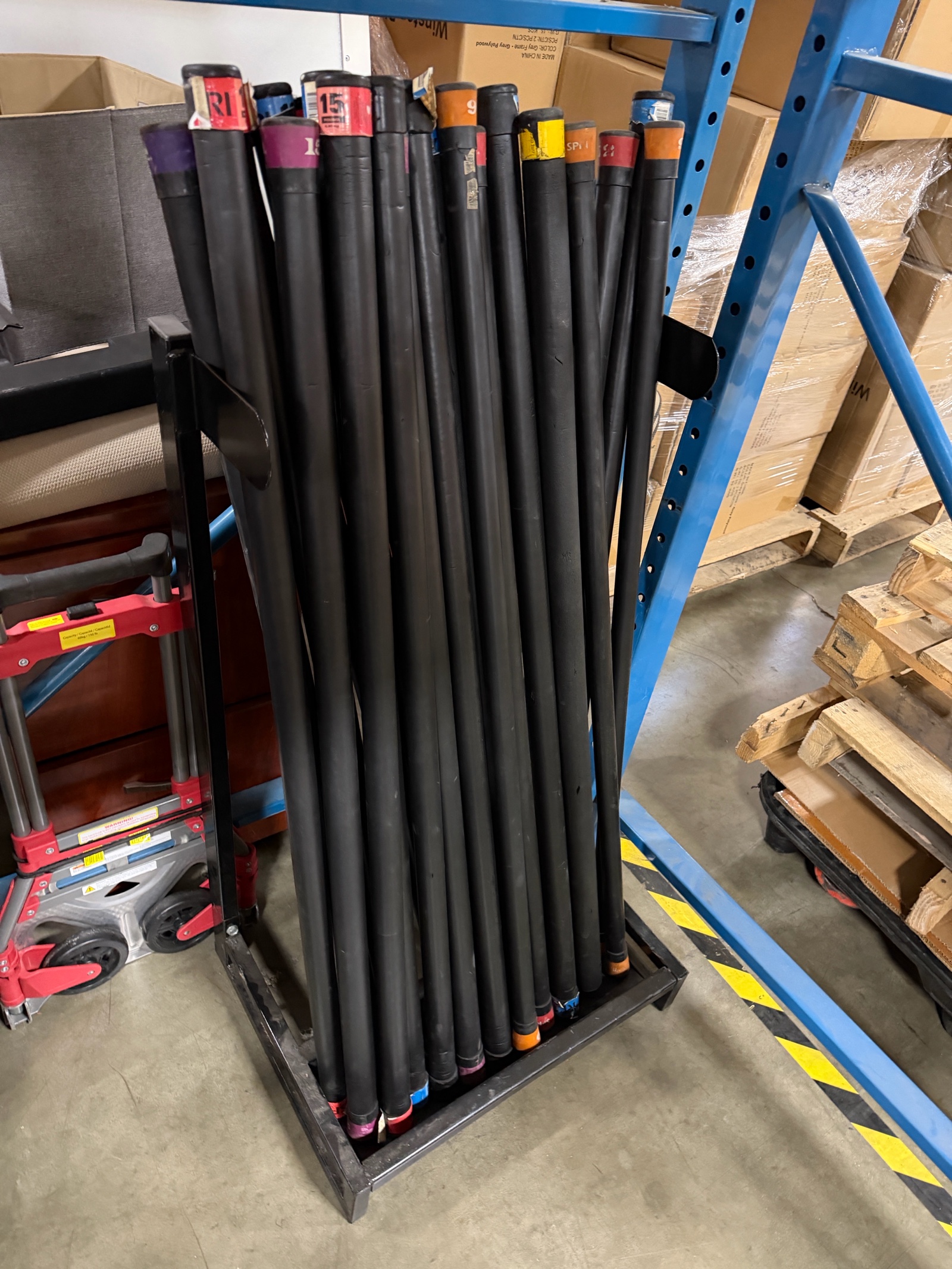 Assorted Weighted Body Bars with Storage Racks - 33 Bars