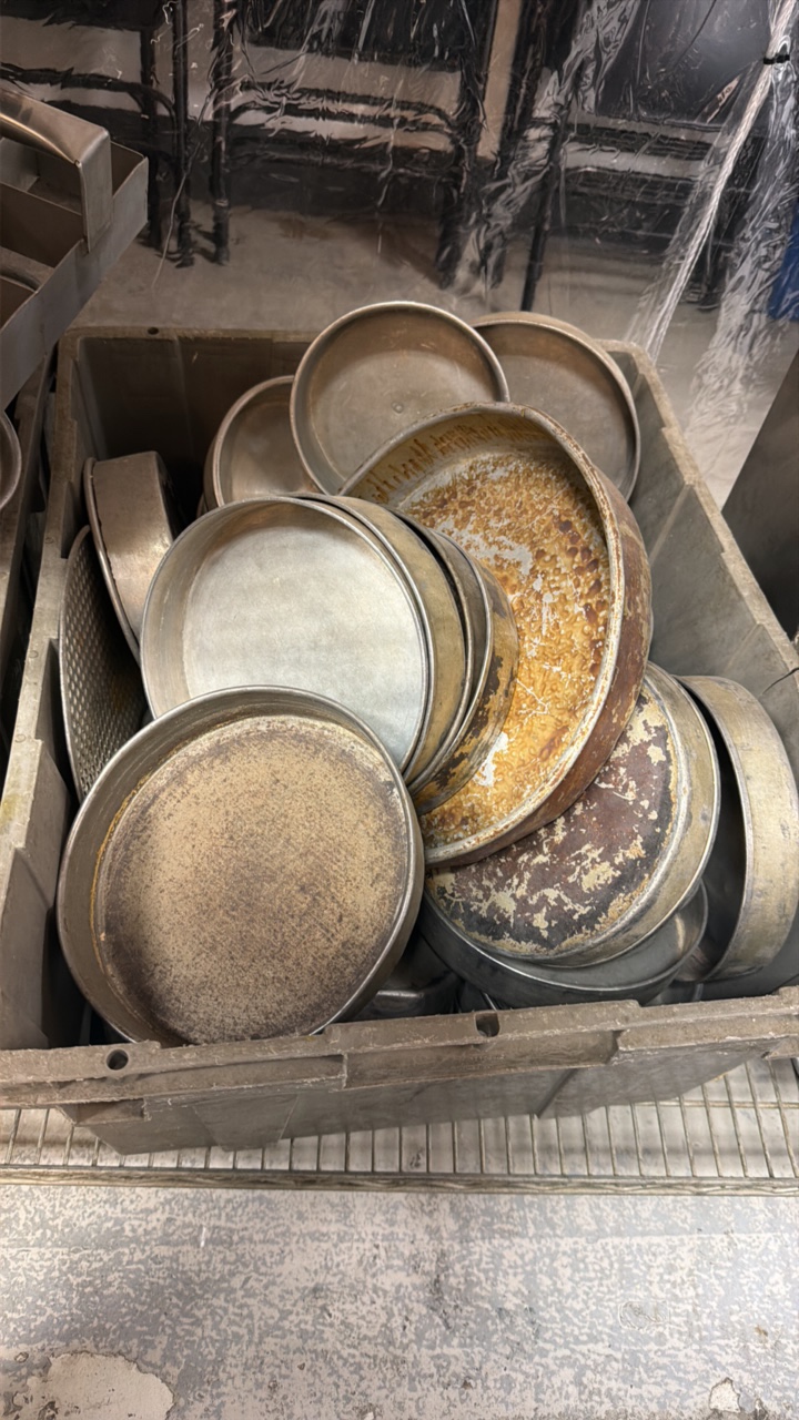 tote of assorted pans