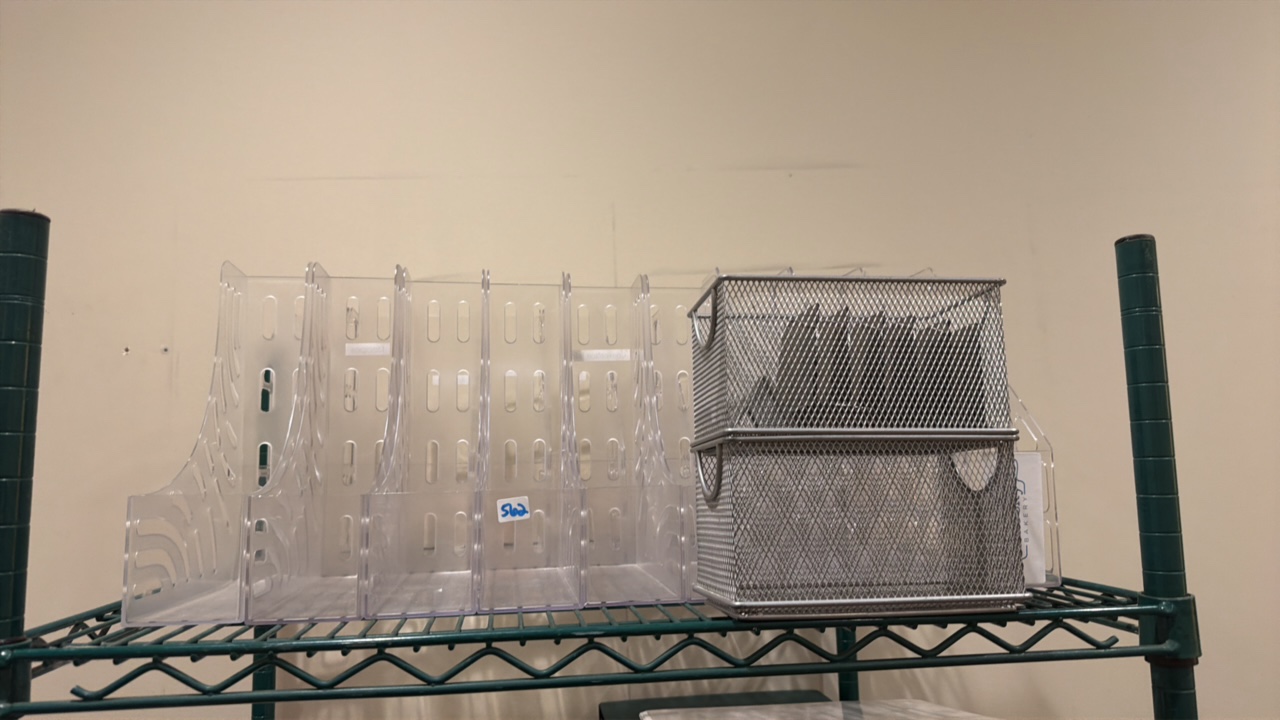 shelf of office supplies