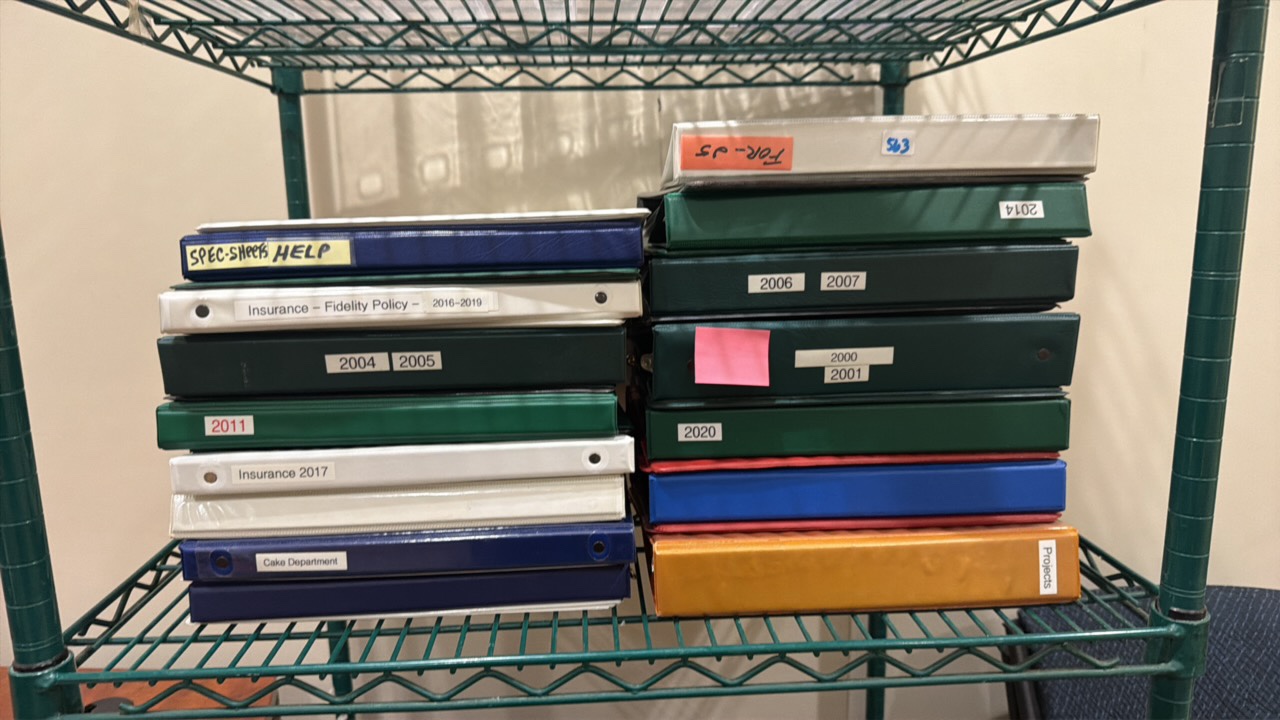 shelf of binders