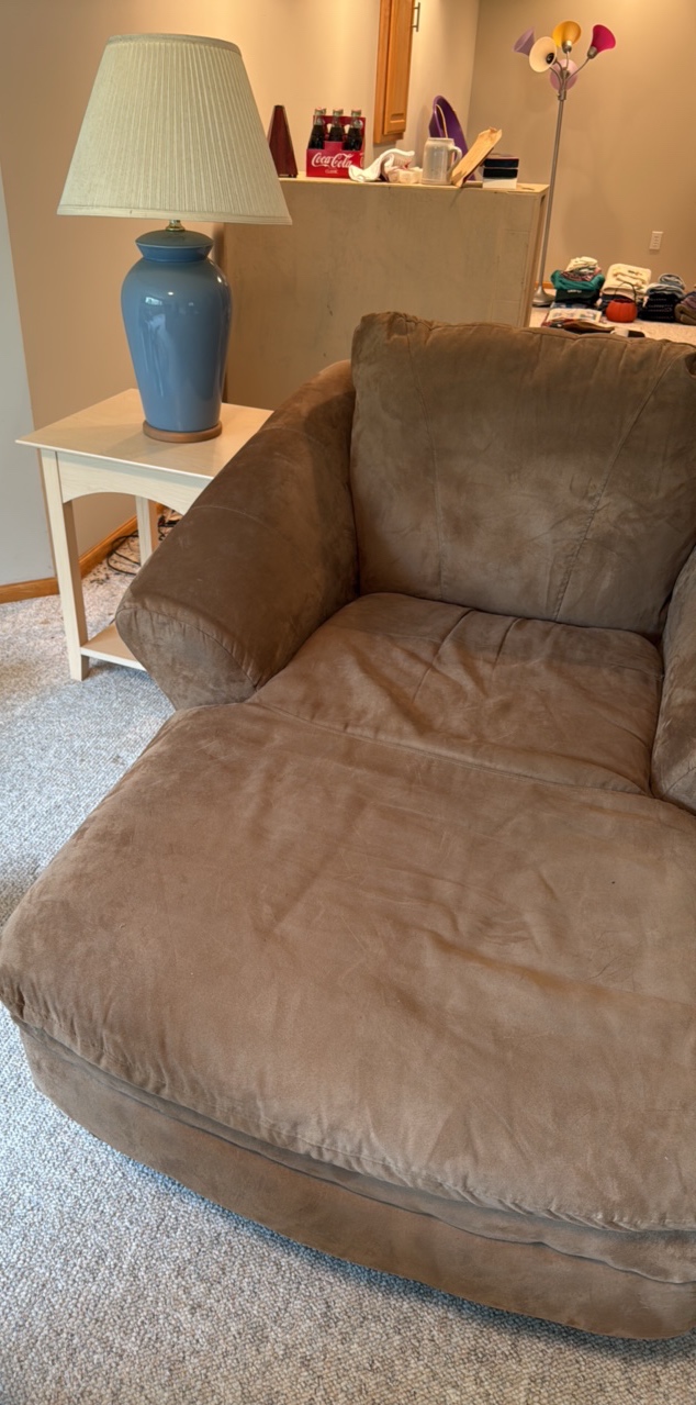 Suede style material Chaise lounge with end table and blue lamp