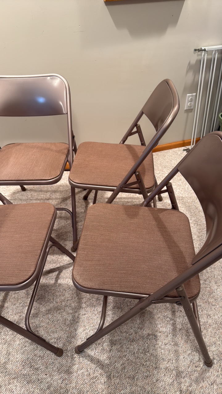 four Samsonite folding chairs