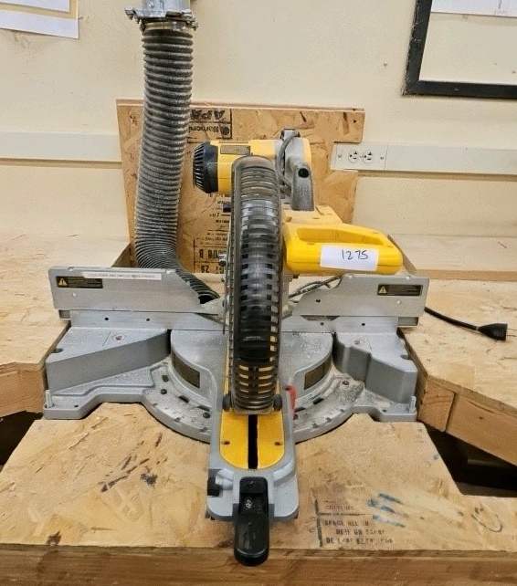 DeWalt DW718 12-inch compound miter saw featuring a 15-amp, 120V motor.