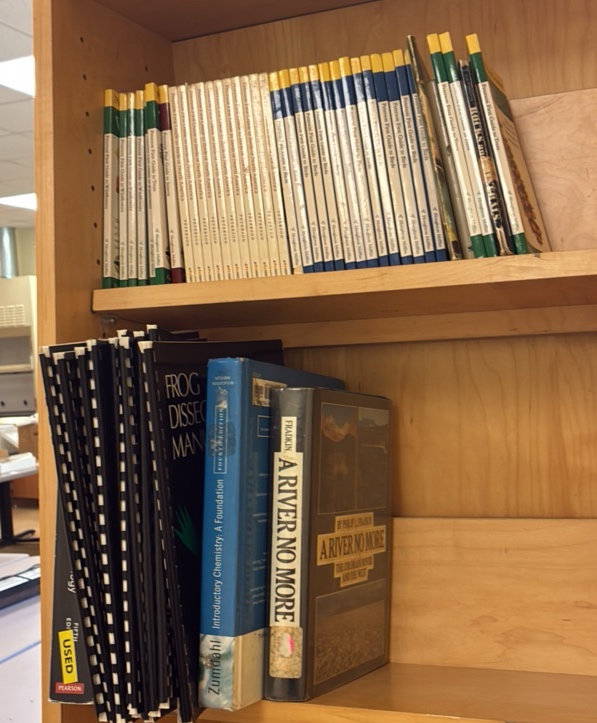 miscellaneous science books and DVDs