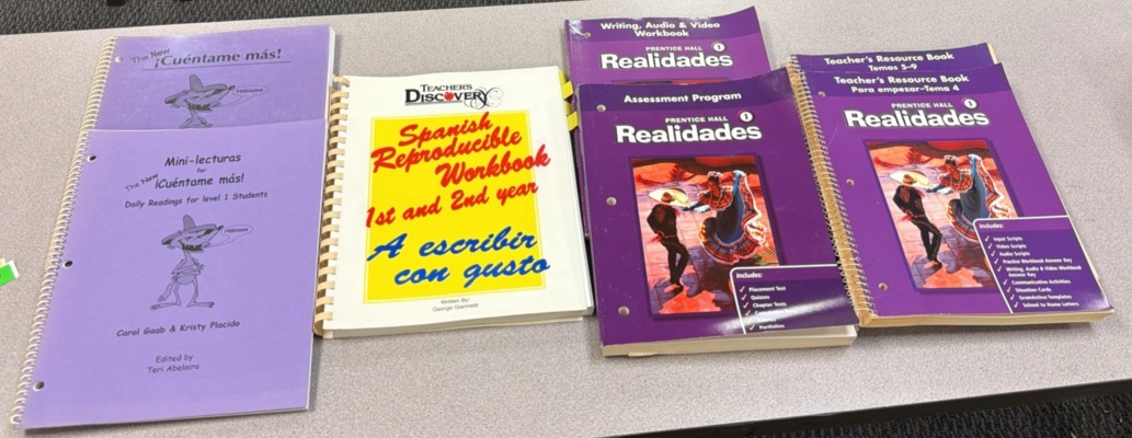 books for level one students, Spanish teacher, resource books, assessment program programs, etc.