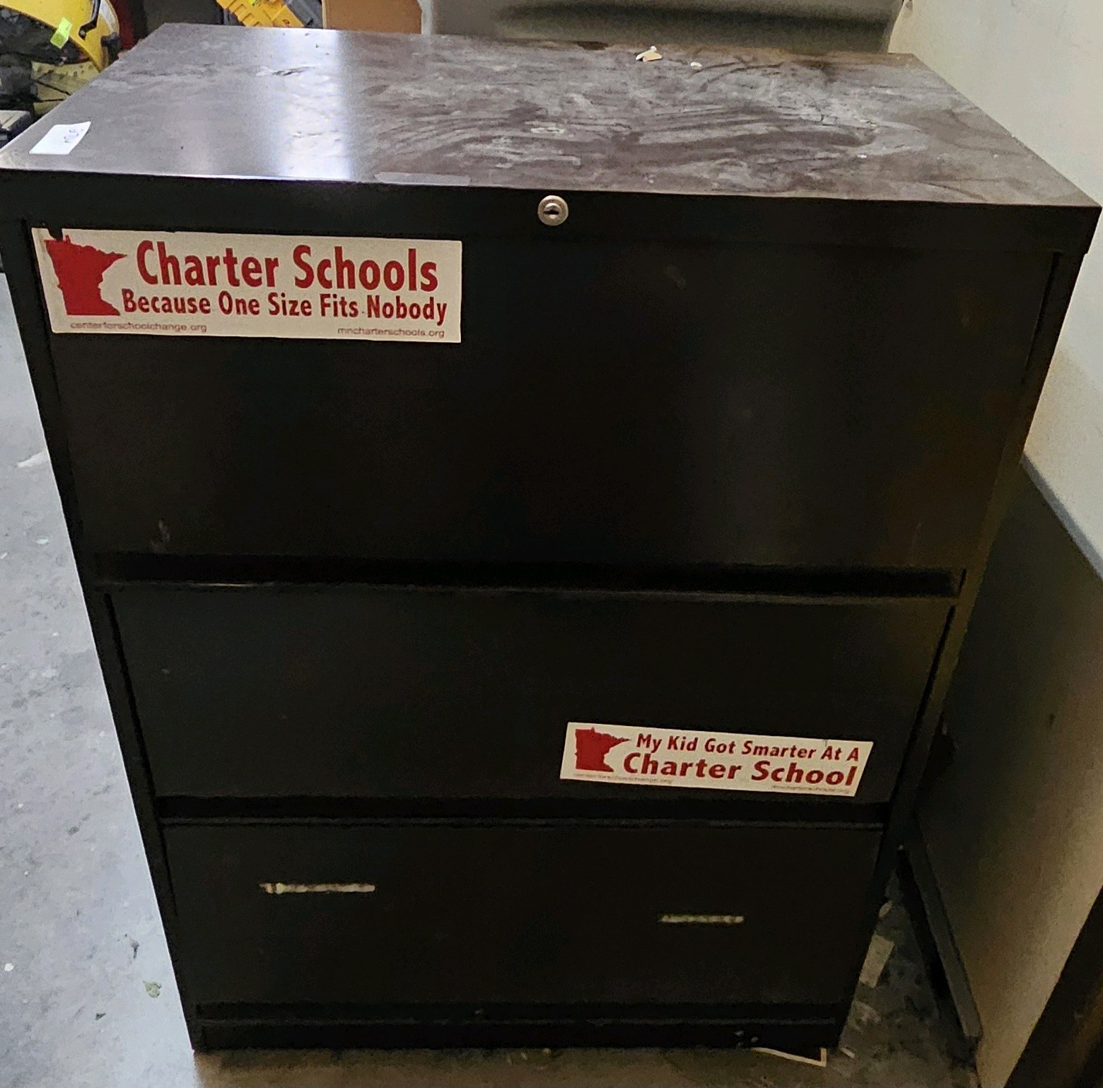 metal cabinet with roll out drawers