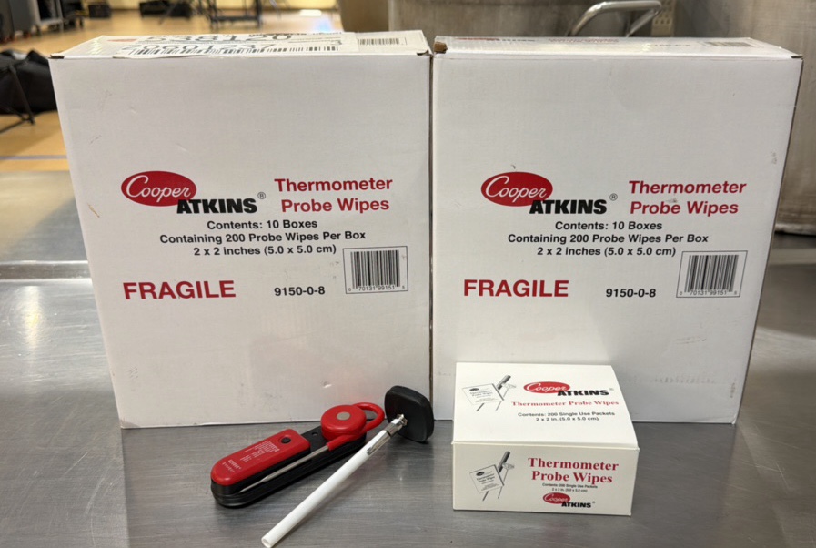 thermometer, probe wipes, boxes, and thermometers
