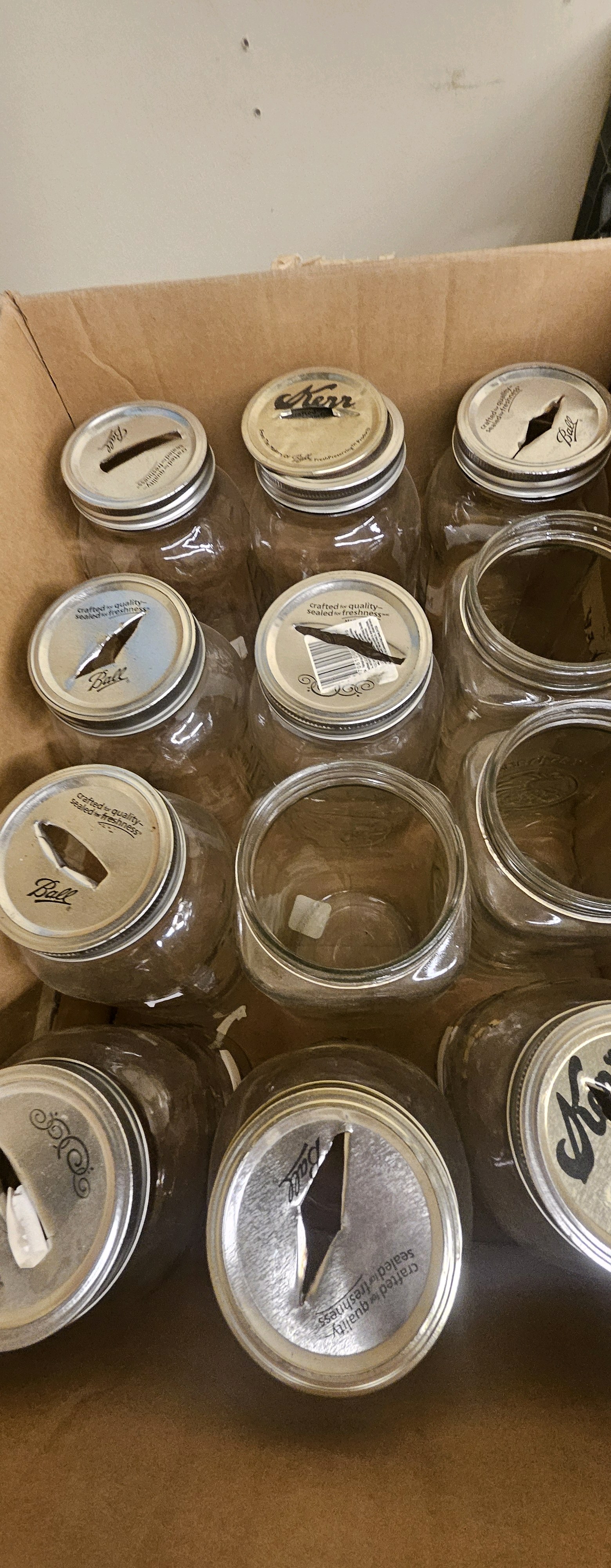 box and two crates of jars