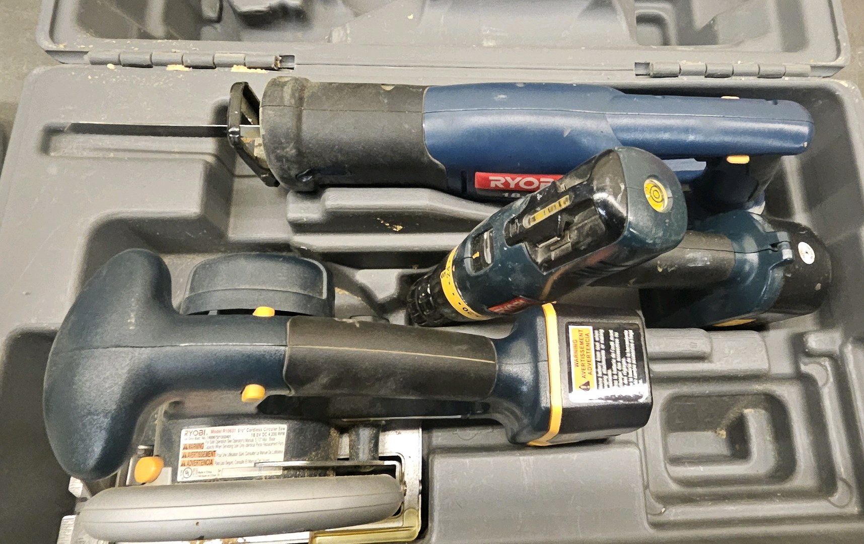assortment of three Ryobi tools
