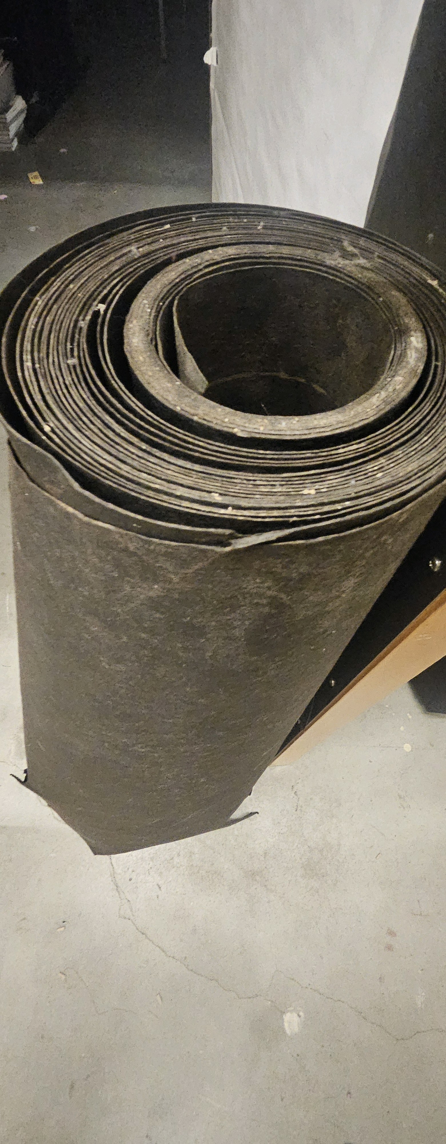 two rolls of asphalt paper