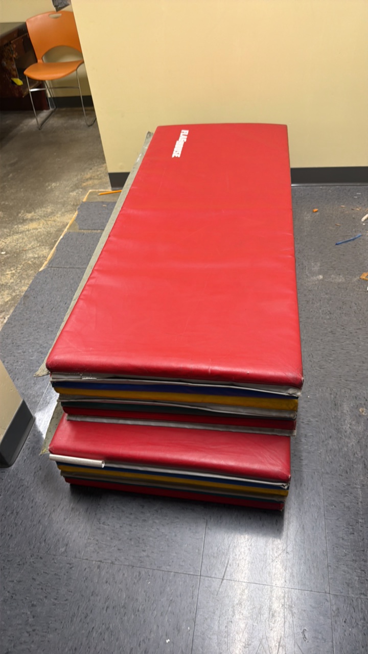 tumbling mats by flag house