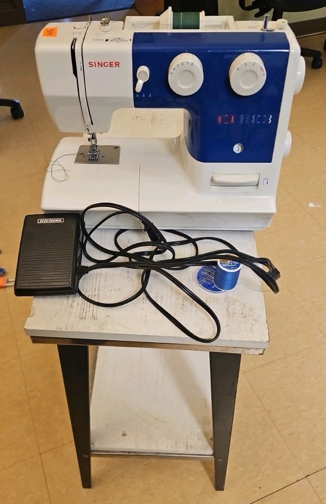 Singer sewing machine with desk