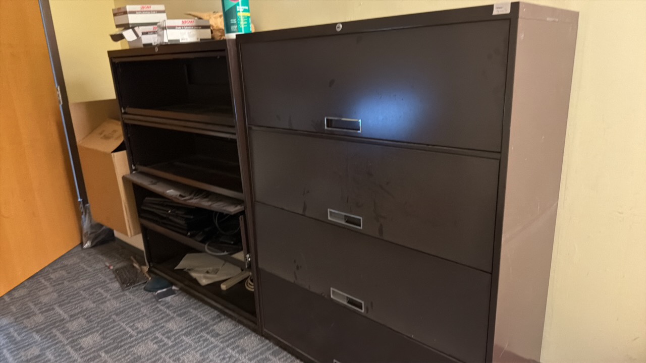 Brown filing cabinets dent in one door front (R117)