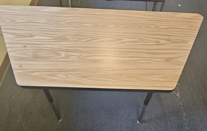 single trapezoid table