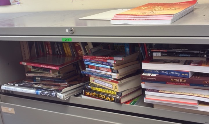 shelf of miscellaneous books