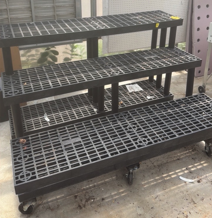 Greenhouse plant display on wheels