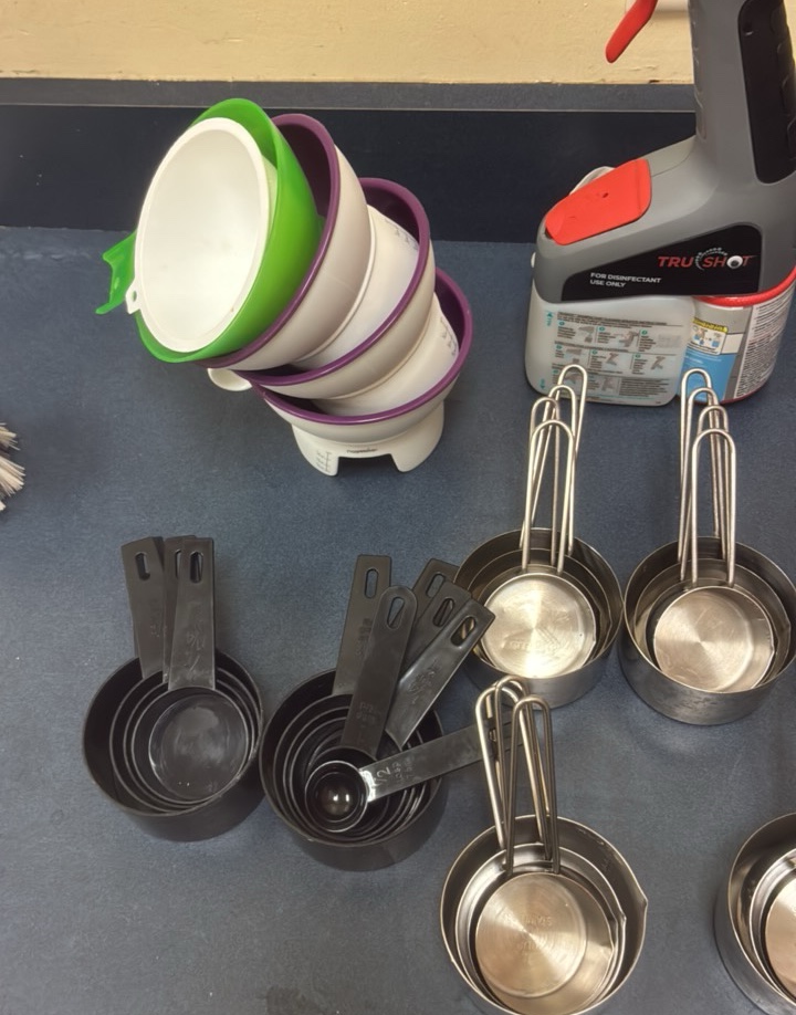 miscellaneous measuring cups and cleaner