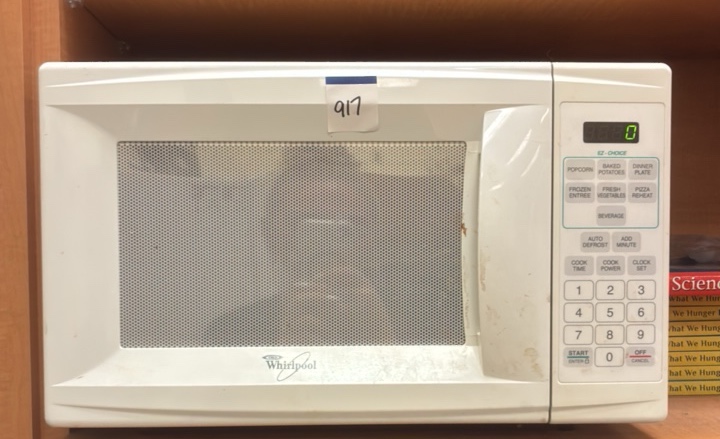 Whirlpool Microwave and books