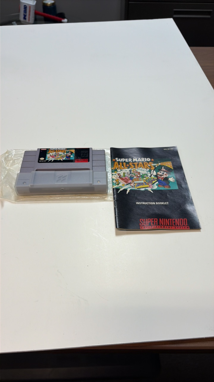Super Mario All-Stars for the Super Nintendo and instruction booklet