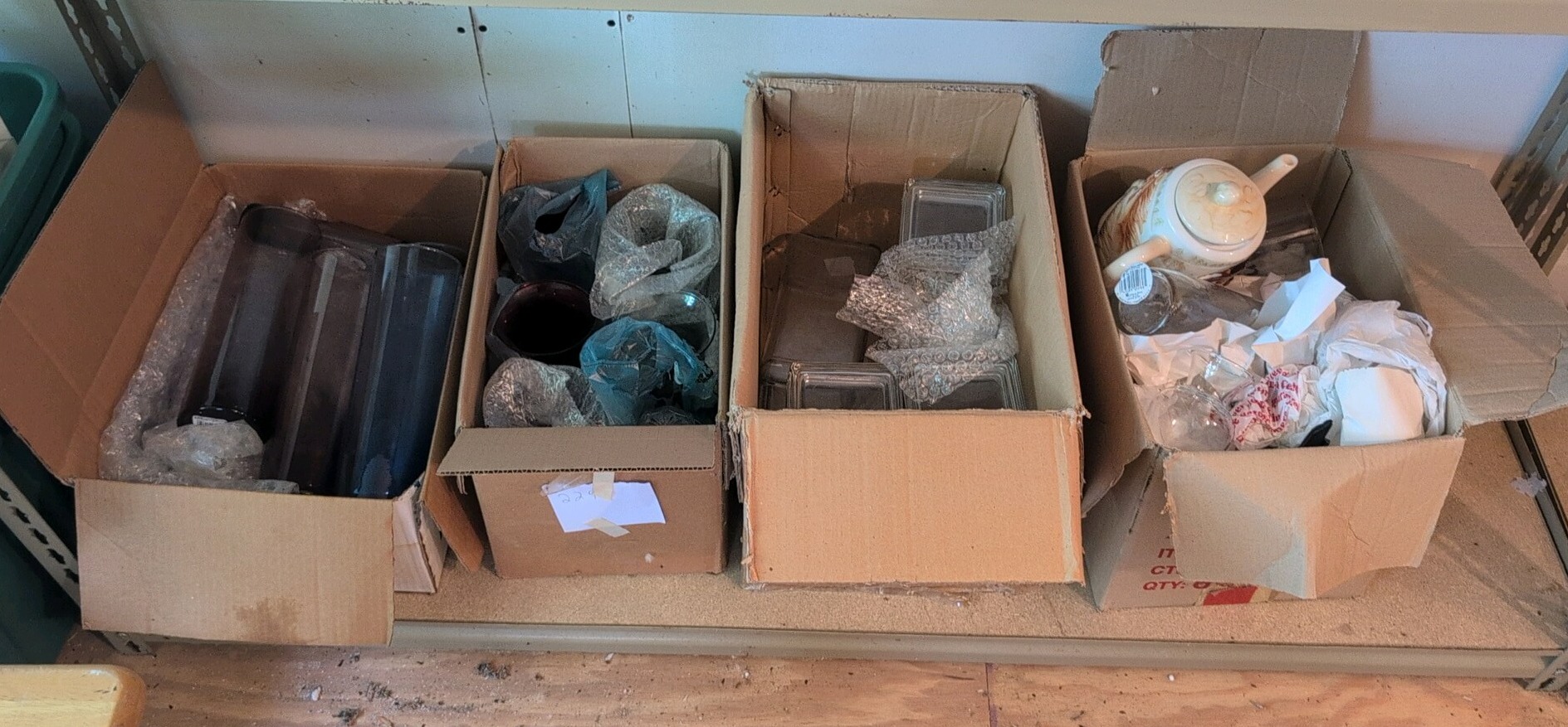 four boxes of glassware was stored outside see pictures