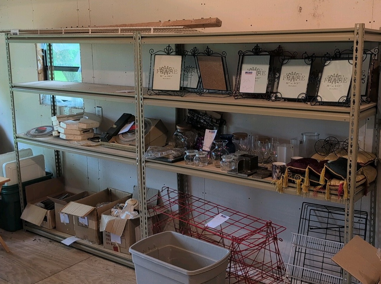 two metal shelves. they are just the shelves and they are 18 and 12 in deep by 71 in tall contents not included