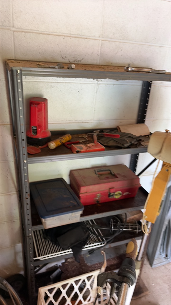 Metal shelving unit and contents
