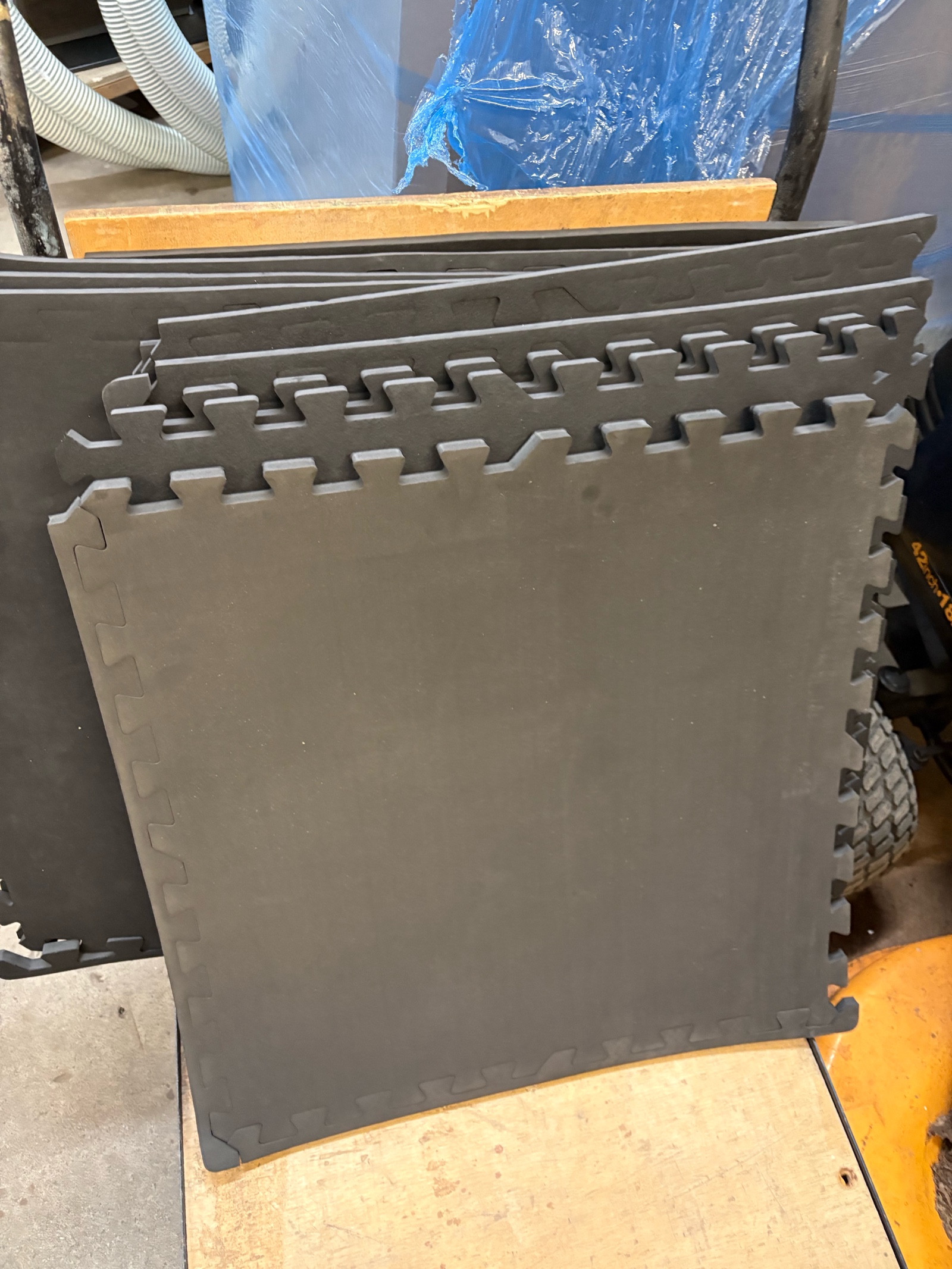 Black Foam Floor Mats, Measurements are About 24 inches by 22.5 inches, can be cut to fit your floor, There are 12 Sqaures Included in This Lot, Many of Them Have the Straight Guards At the Edges So You Can Make a Clean Edge and Corner, Great for Basement
