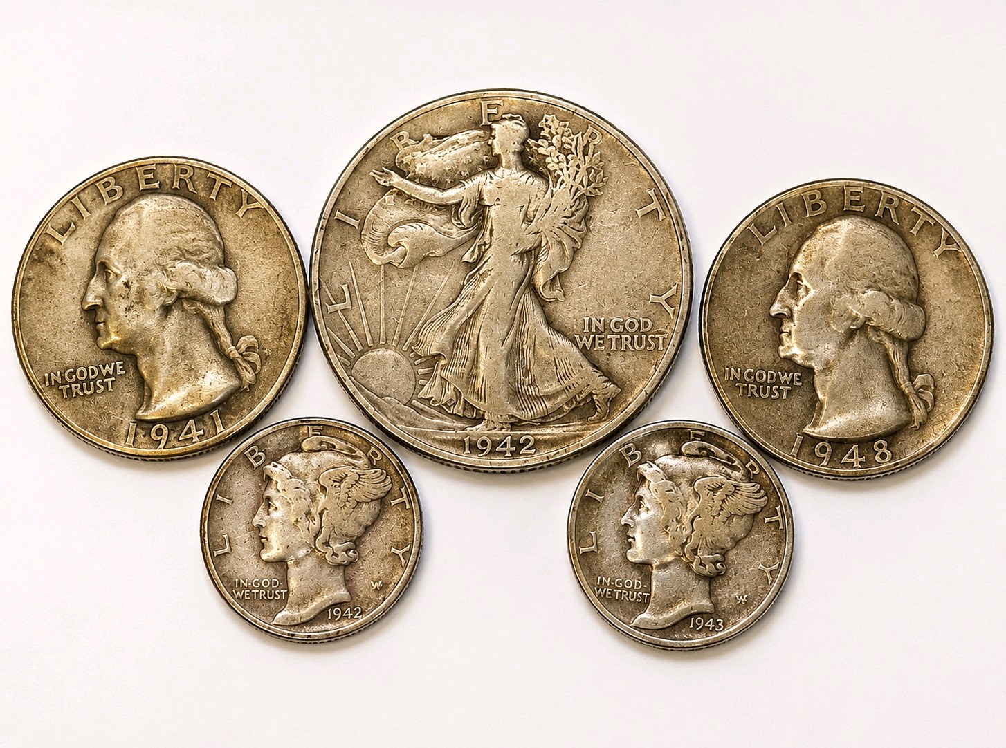 90% Silver U.S. Coin Lot  Walking Liberty Half, Washington Quarters & Mercury Dimes about 0.858 troy oz actual silver weight.