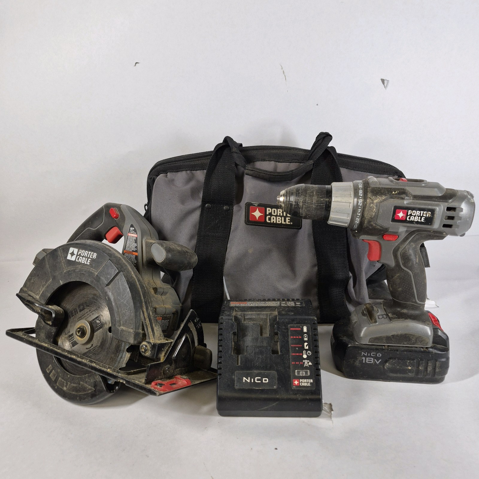 Porter-Cable 18V NiCd Cordless Drill, Circular Saw, Charger, Battery, and Tool Bag Lot