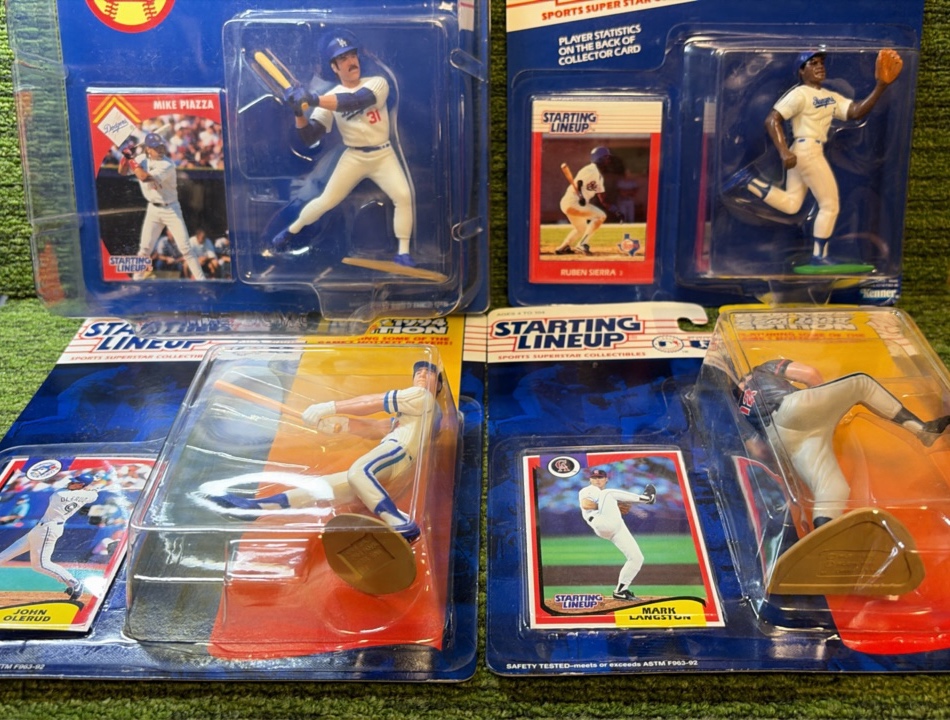 Mixed Lot of 4 Starting Lineups 1995 SLU Nomar Beuerlein Raines Delgado MIP Baseball