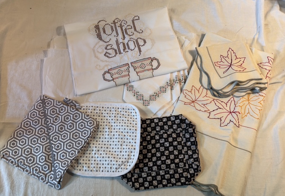 Hand Embroidered Linens and Hand Made Potholders
