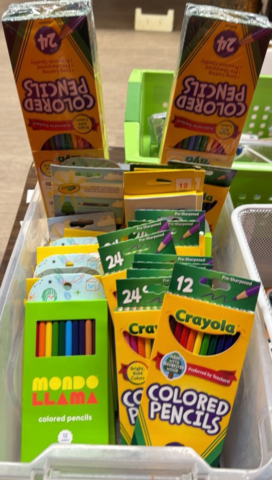 brand new packs of colored pencils, approximately 30 packages