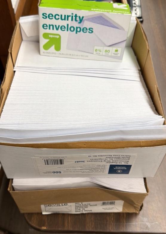 three boxes of envelopes