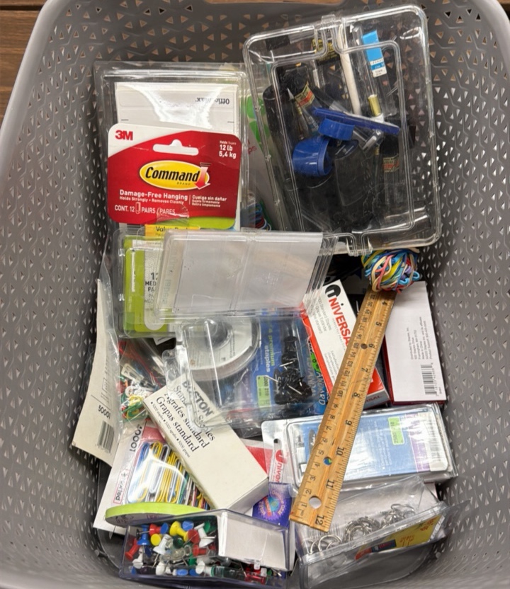 Bin of tacks, staples, tape, pencils, sharpeners, pencil lead, rulers, key tags, pushpins and paper clips