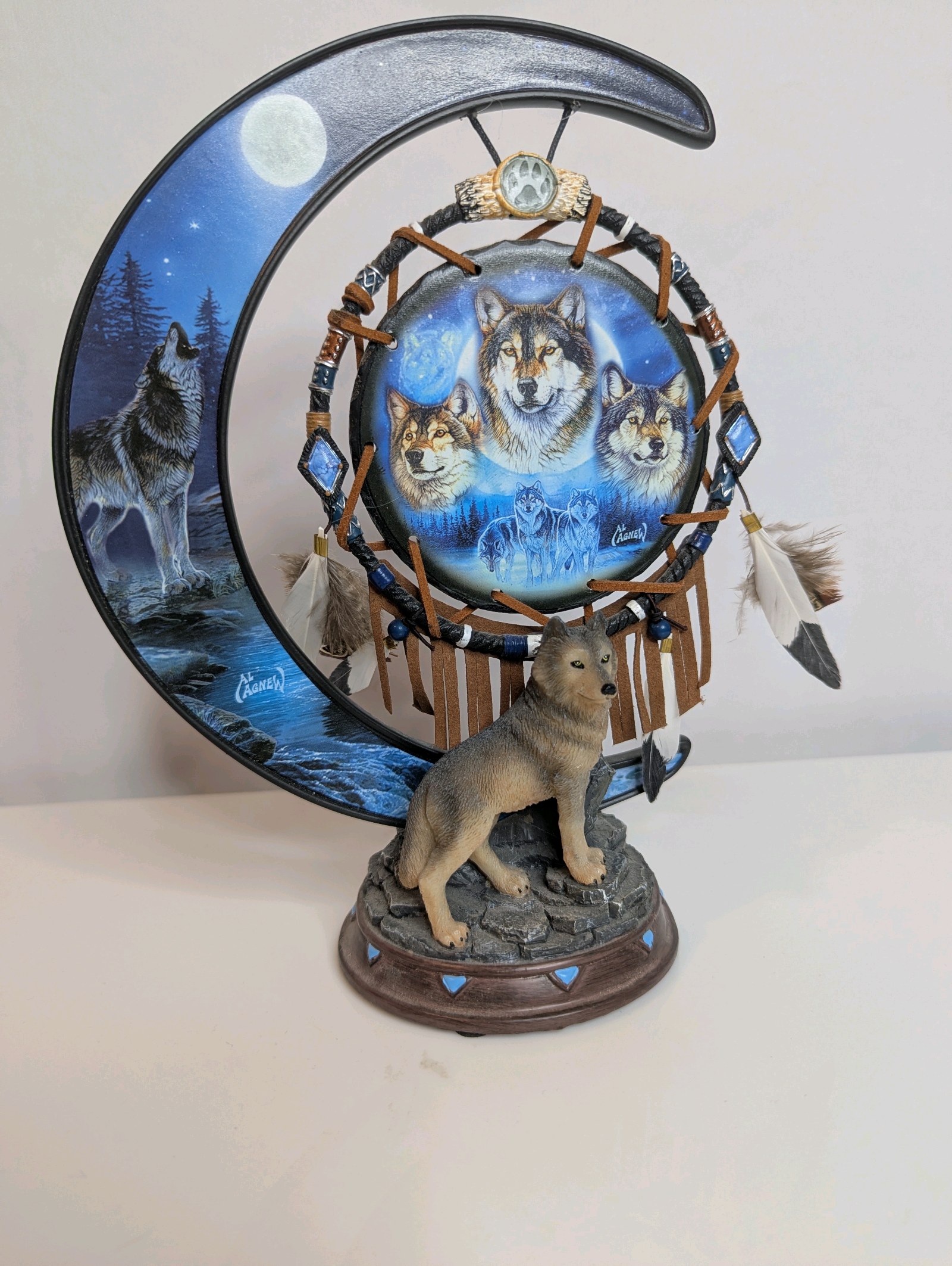 Dreams of the Spirit wolf art glow-in-the-dark crescent moon sculpture