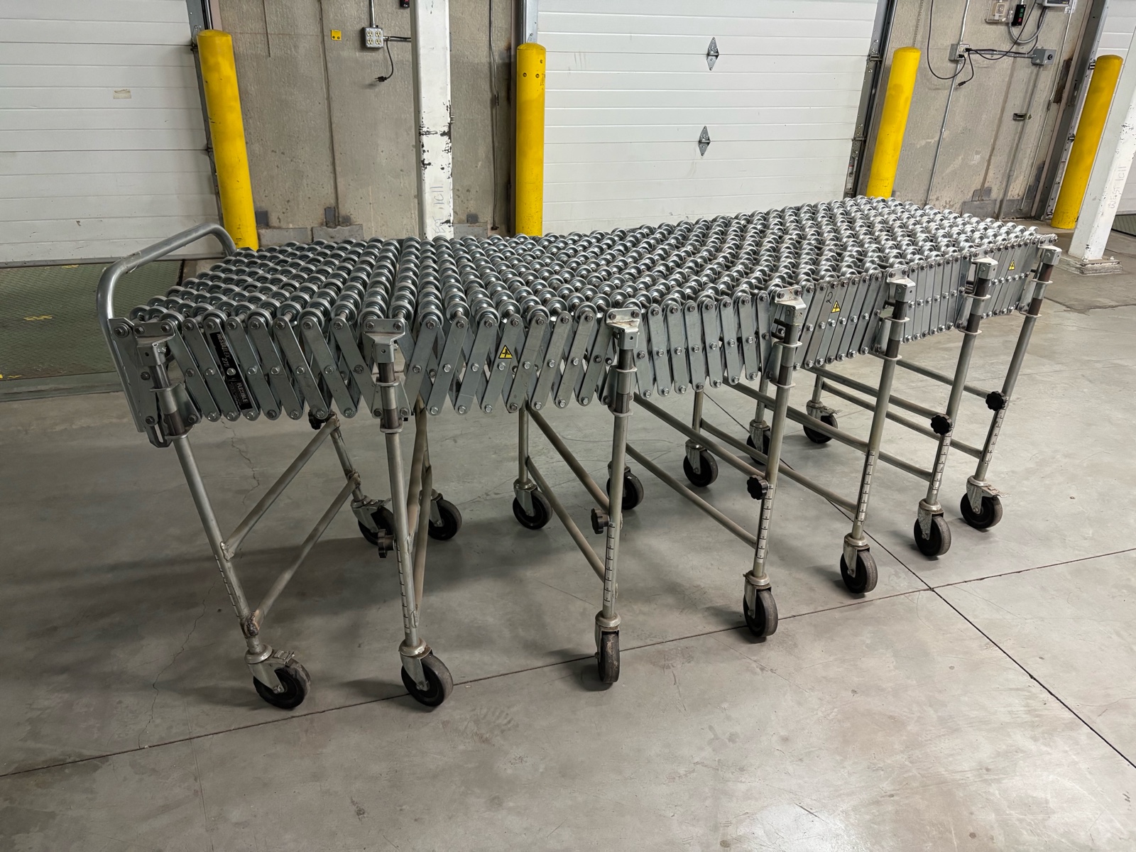 Collapsable Accordian Style Skate Wheel Conveyor 80 Minimum to 275 Maximum 24 Wide