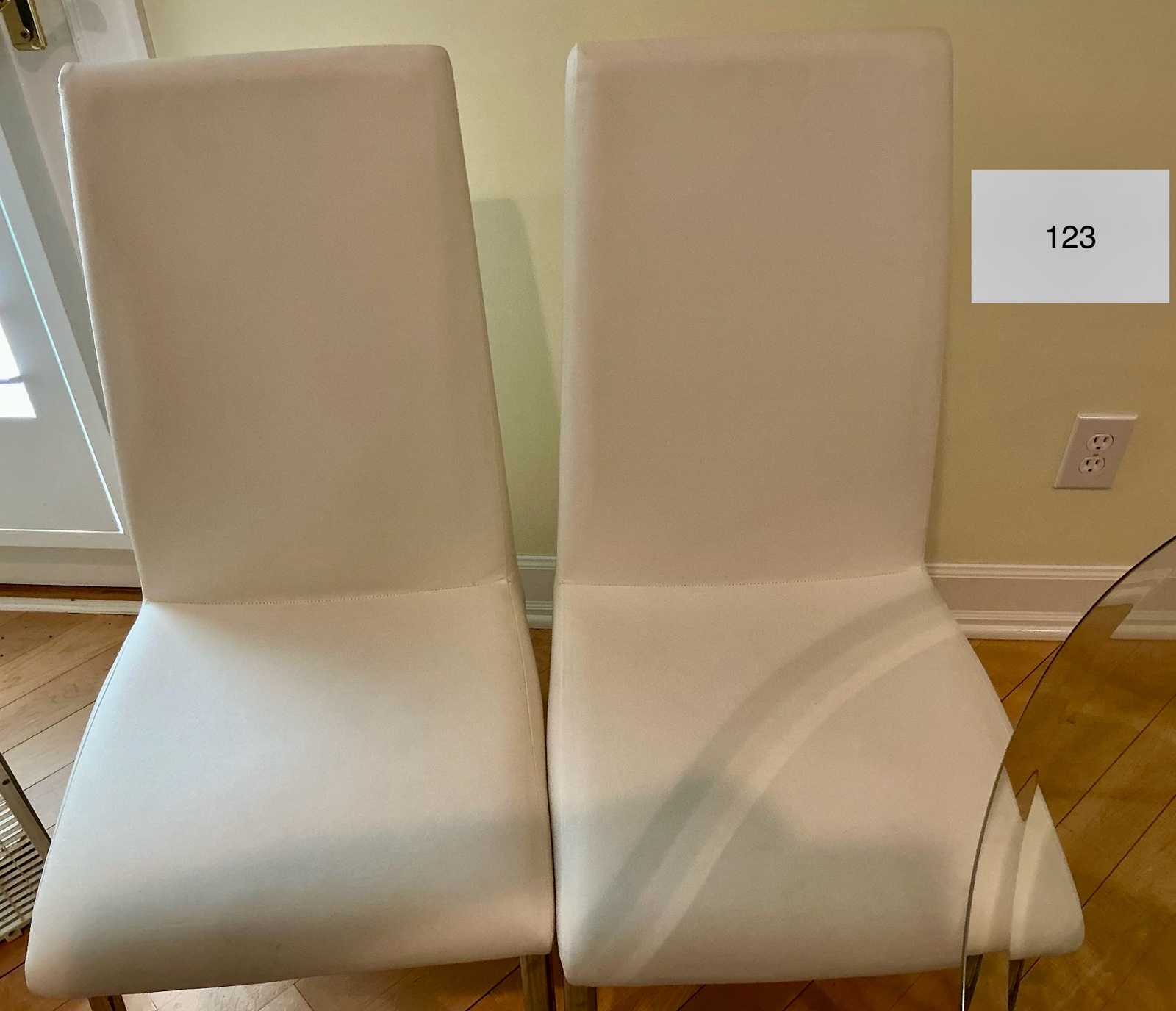 Set of 2 America Glenview white side chairs, white faux leatherette material