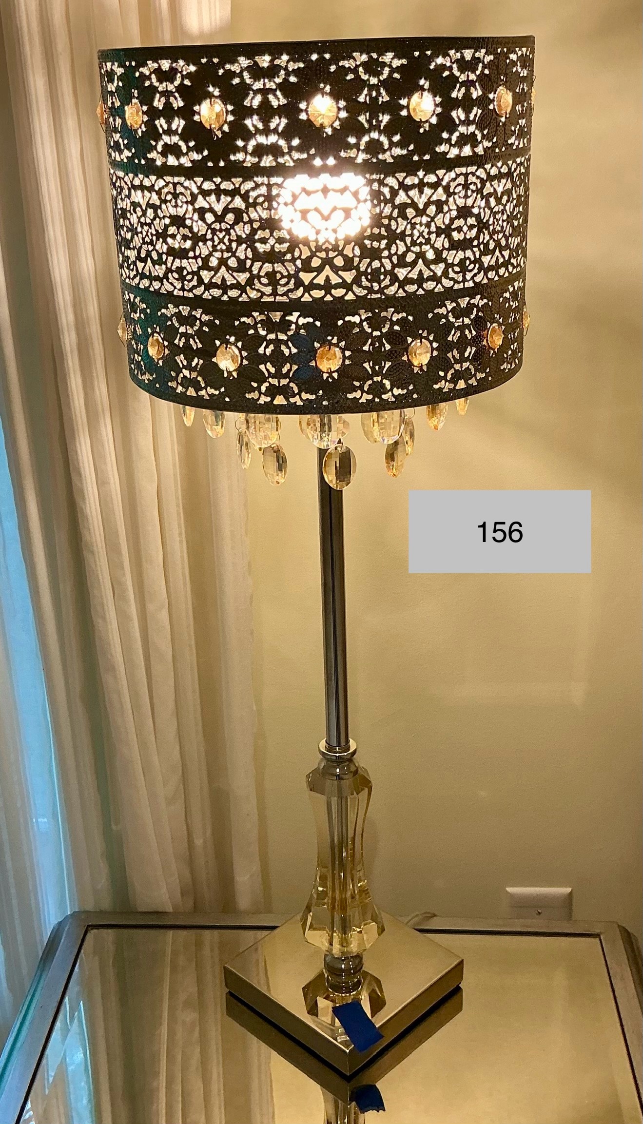 Opulent lamp with metal shade, amber crystals and polished chrome stand