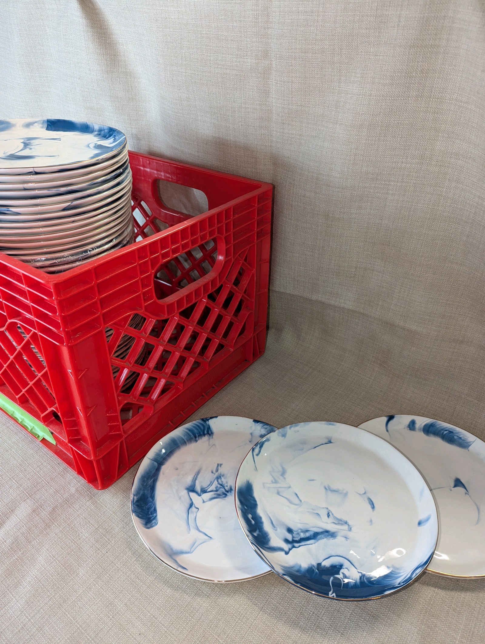Crate of (45) Anthropologie stoneware plates blue and white marble pattern, gold rim