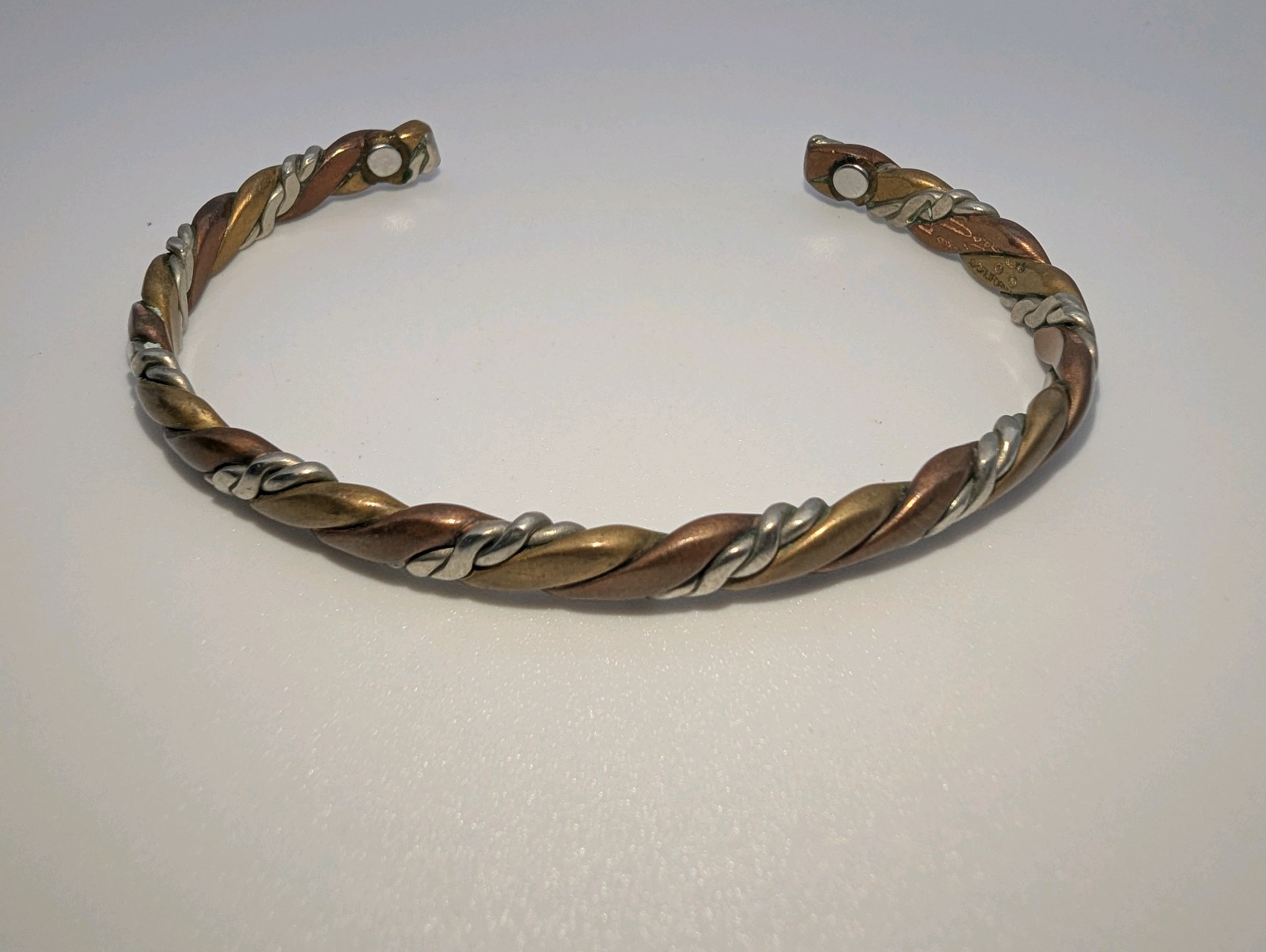 Sergio Lub tri-color cuff bracelet,twisted braided design-copper, jewelers brass, and German silver, Size 7.5