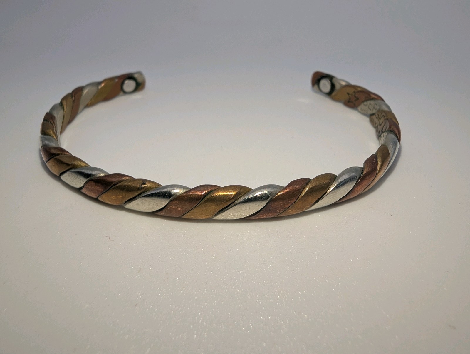 Sergio Lub twisted cuff bracelet features a tri-color design- copper, brass, and German silver  Size 7