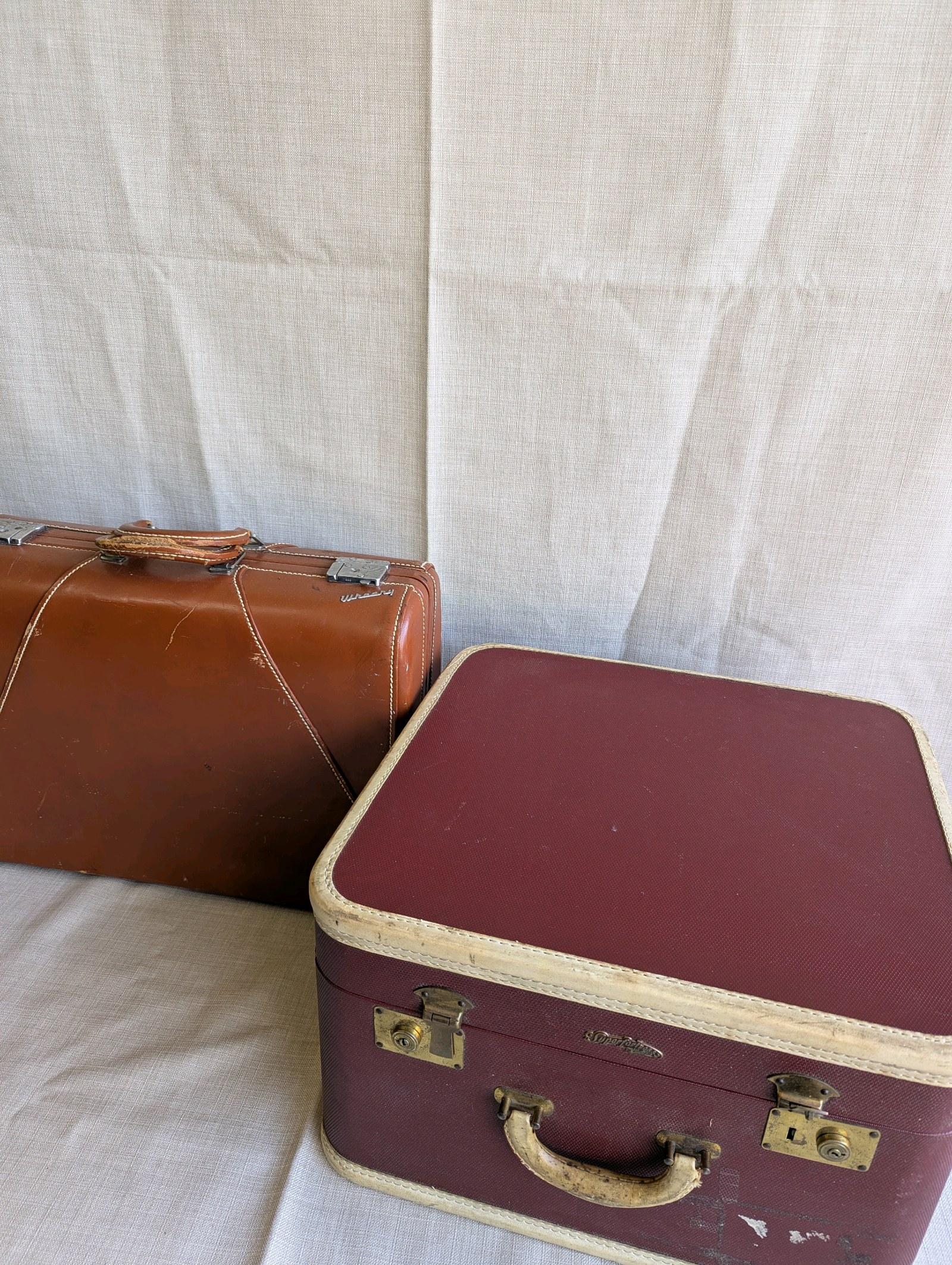 (2) Vintage hard-shell suitcases, Superfortress and Wheary