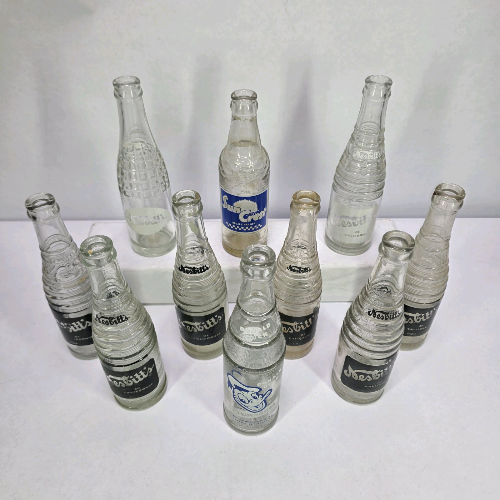 Lot of Clear Glass ACL Soda Bottles Sun Crest NuGrape Nesbitts Mascot