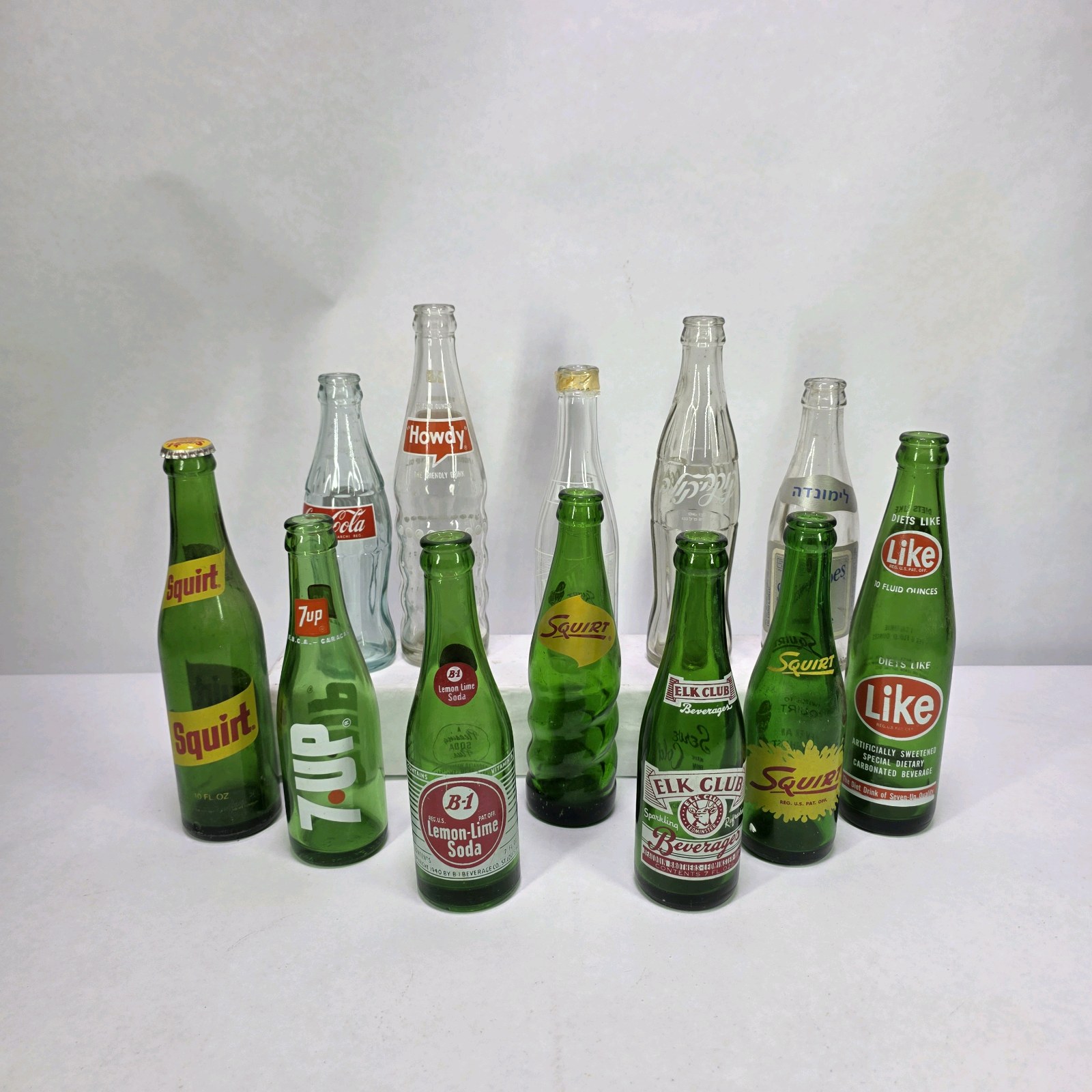 Lot of Vintage Soda Bottles 7UP Squirt Nesbitts Like Coca-Cola Green Glass