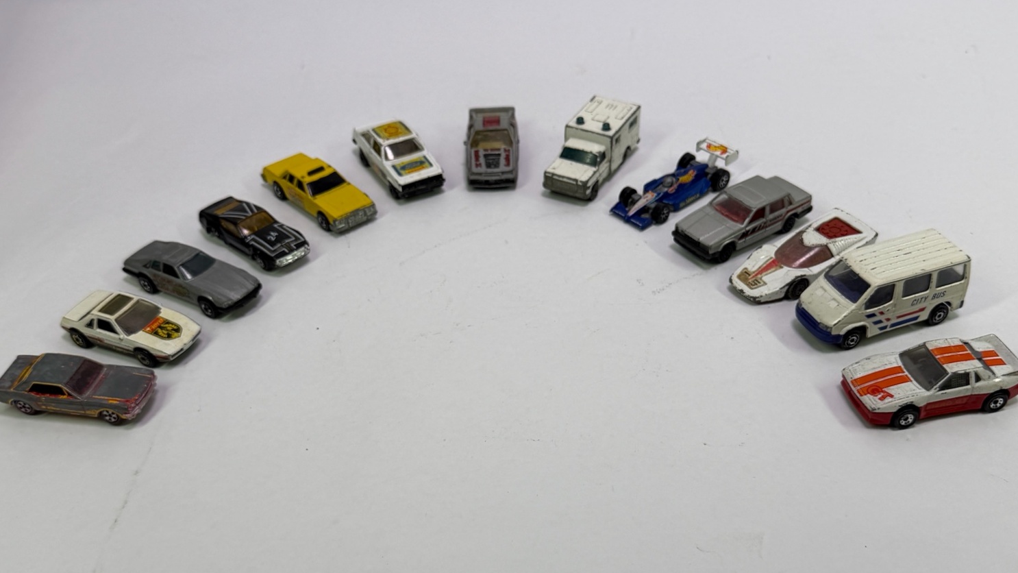 Lot of 13 Die-Cast Toy Cars, Trucks, Police, Taxi, and Race Vehicles