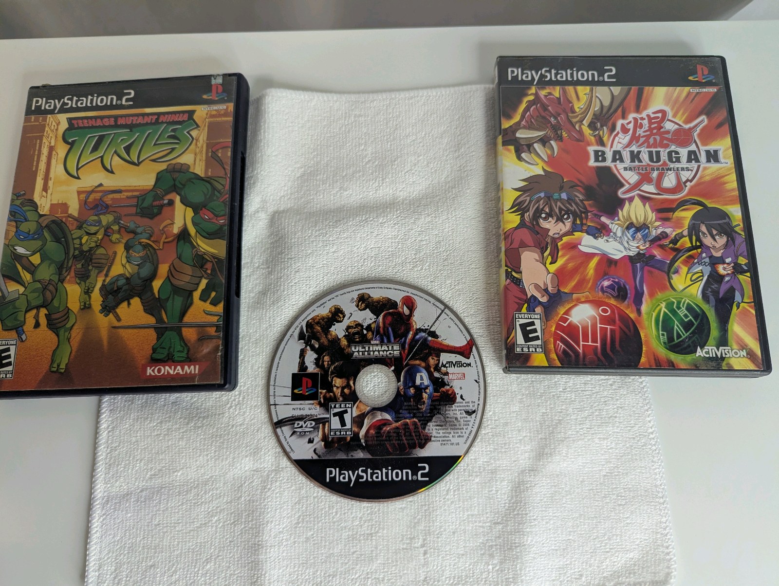 (3) PS2 Games- Bakugan Battle Brawlers, Marvel Ultimate Alliance, Teenage Mutant Ninja Turtles
