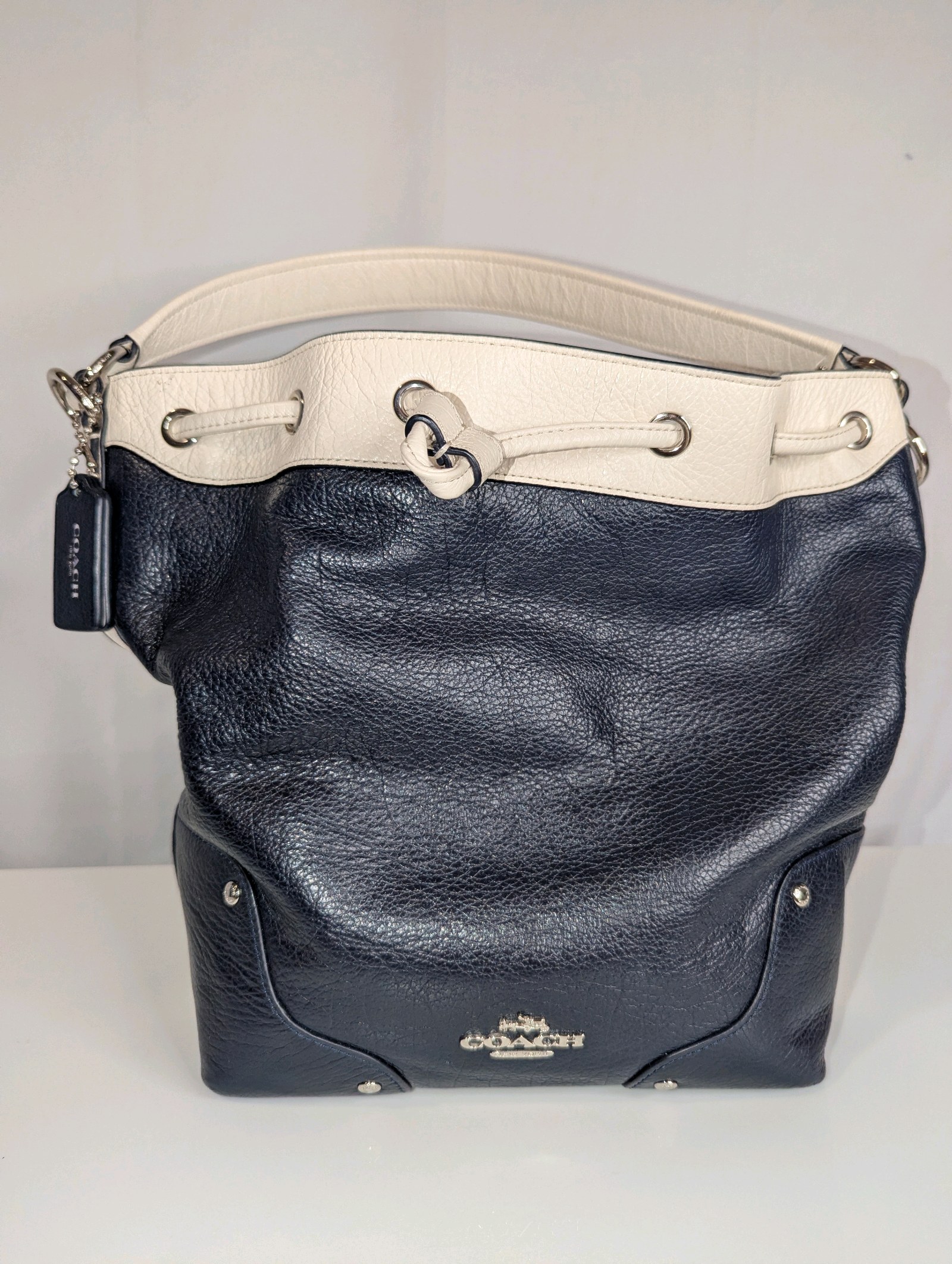 Coach Mickie Drawstring bag in dark navy and white spectator pebble leather